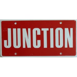 Americká reklamní SPZ prodejců automobilů JUNCTION